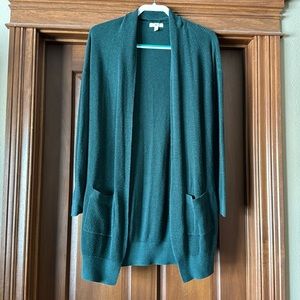 Dark green cardigan with pockets. BP size small